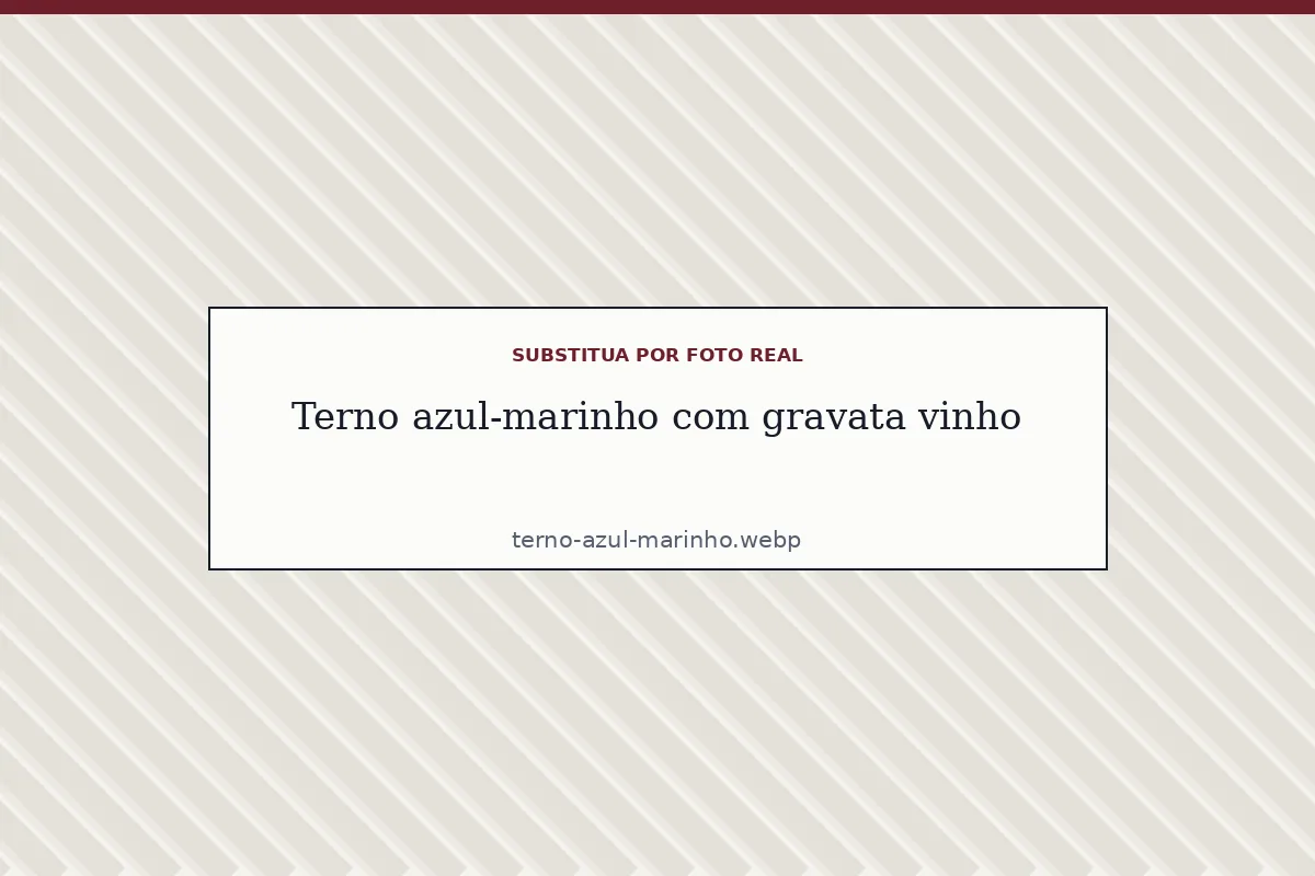 Terno azul-marinho com camisa branca e gravata vinho